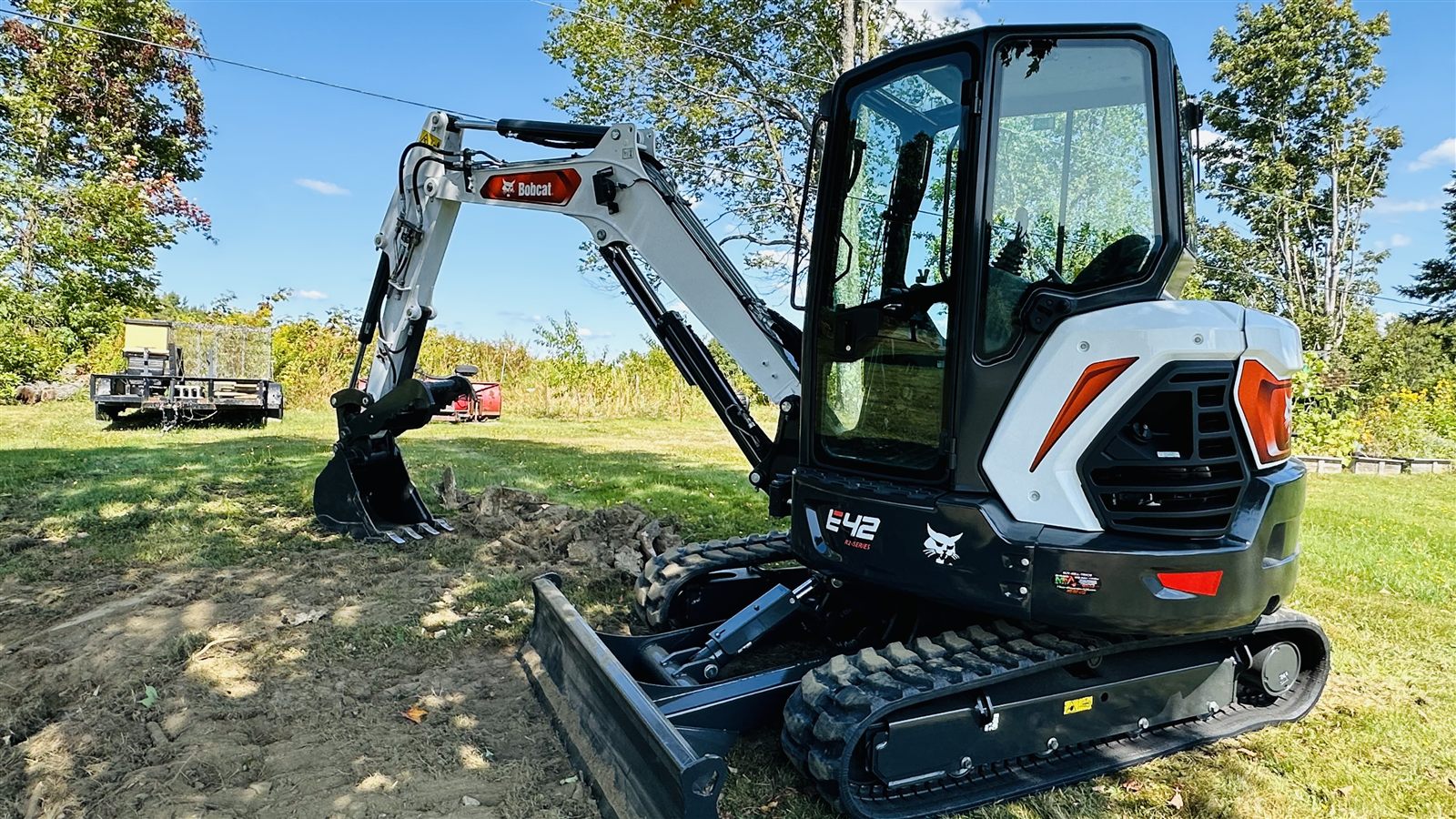 Northland compact excavator on a residential property